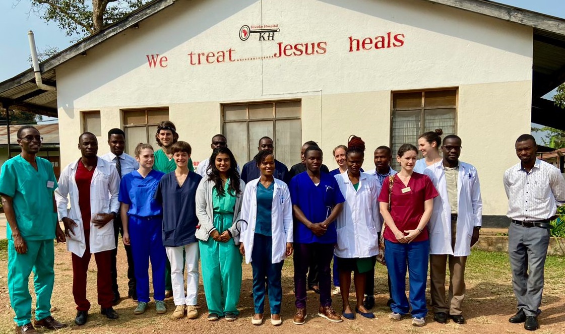 Doctors at Kiwoko gable wall